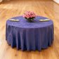 Crinkle Shimmer 132" Round Tablecloth Purple table setup with floral centerpiece, gold charger plates and ivory napkins