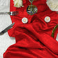 Crinkle Shimmer Table Runner Red scrunched with silverware, led tea lights and white roses