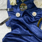 Crinkle Shimmer Table Runner Royal Blue bunched up with led tea light candels and white roses