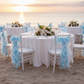 beachside sunset reception with Curly Willow Chair Sash - Baby Blue