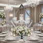 Diamond Shape Centerpiece with Hanging Chandelier Silver paired with silver charger plate, wine goblets, white floral centerpiece on top a round table