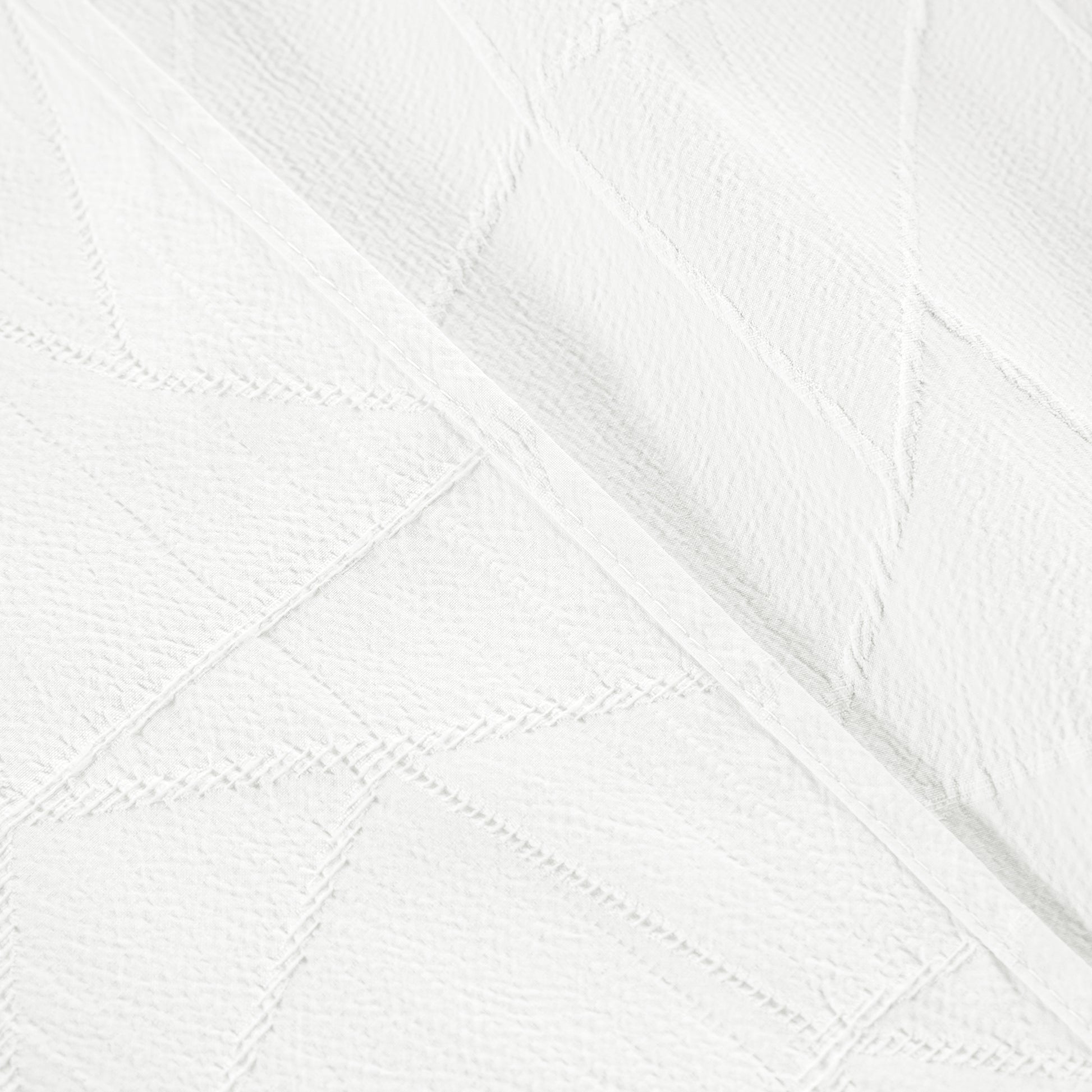 Embossed Geometric Jacquard 90"x156" Rectangle Tablecloth - Light Ivory/Off White hemmed edge close up