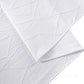 Embossed Geometric Jacquard Table Runner White hemmed edge close up