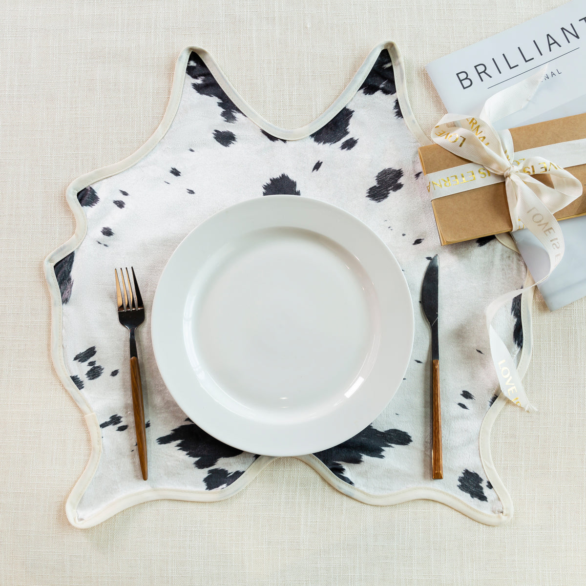 Faux Cowhide 20"x19" Placemats/Napkins (Set of 4) - Black Lifestyle Image
