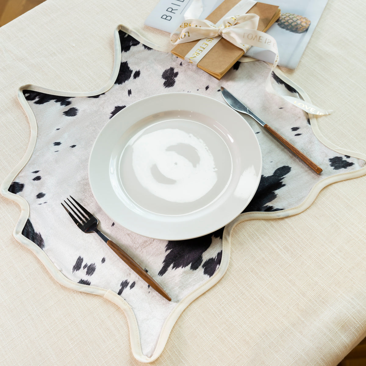 Faux Cowhide 20"x19" Placemats/Napkins (Set of 4) - Black Lifestyle Image