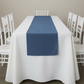 Faux Denim Table Runner - Dark Blue on top of ivory tablecloth