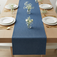 Faux Denim Table Runner - Dark Blue on top of plain table with flower centerpieces