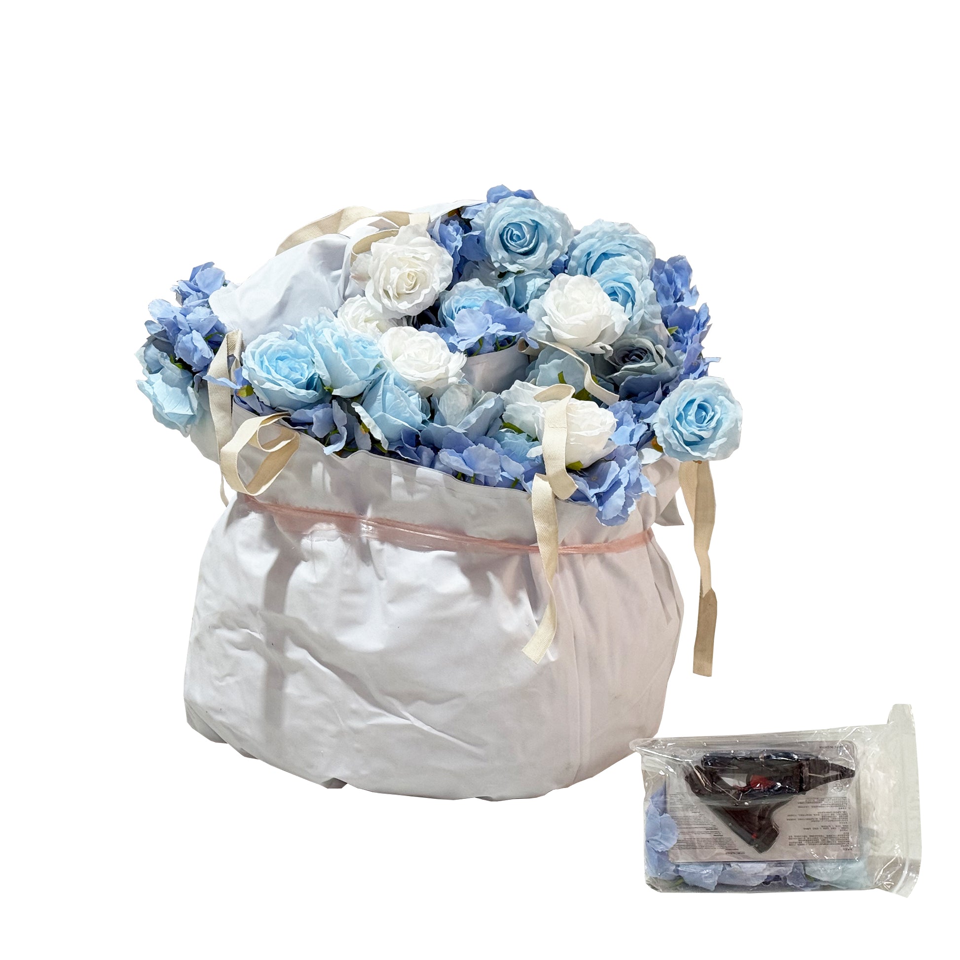 Floral 3D Backdrop Crescent Moon Stand Baby Blue folded to store with extra floral and glue gun