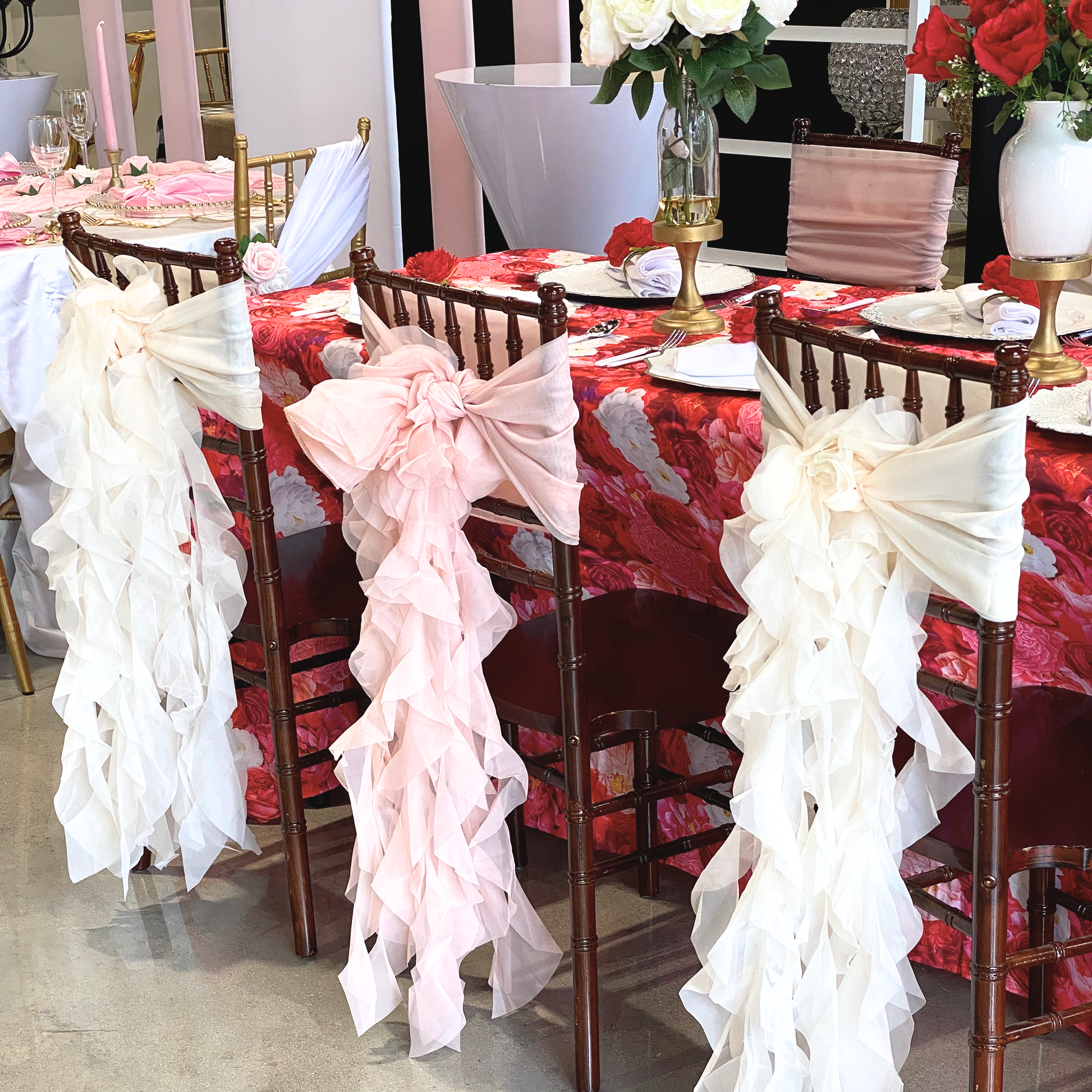 Valentine's Day Mock up with Floral Peony Roses 90"x132" Rectangular Tablecloth Fuchsia, polyester white napkins, floral peony napkin rings, floral centerpieces, and set of soft curly willow ruffles chair sash and cap