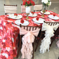 Valentine's Day Mock up with Floral Peony Roses 90"x156" Rectangular Tablecloth Fuchsia, polyester white napkins, floral peony napkin rings, floral centerpieces, and set of soft curly willow ruffles chair sash and cap
