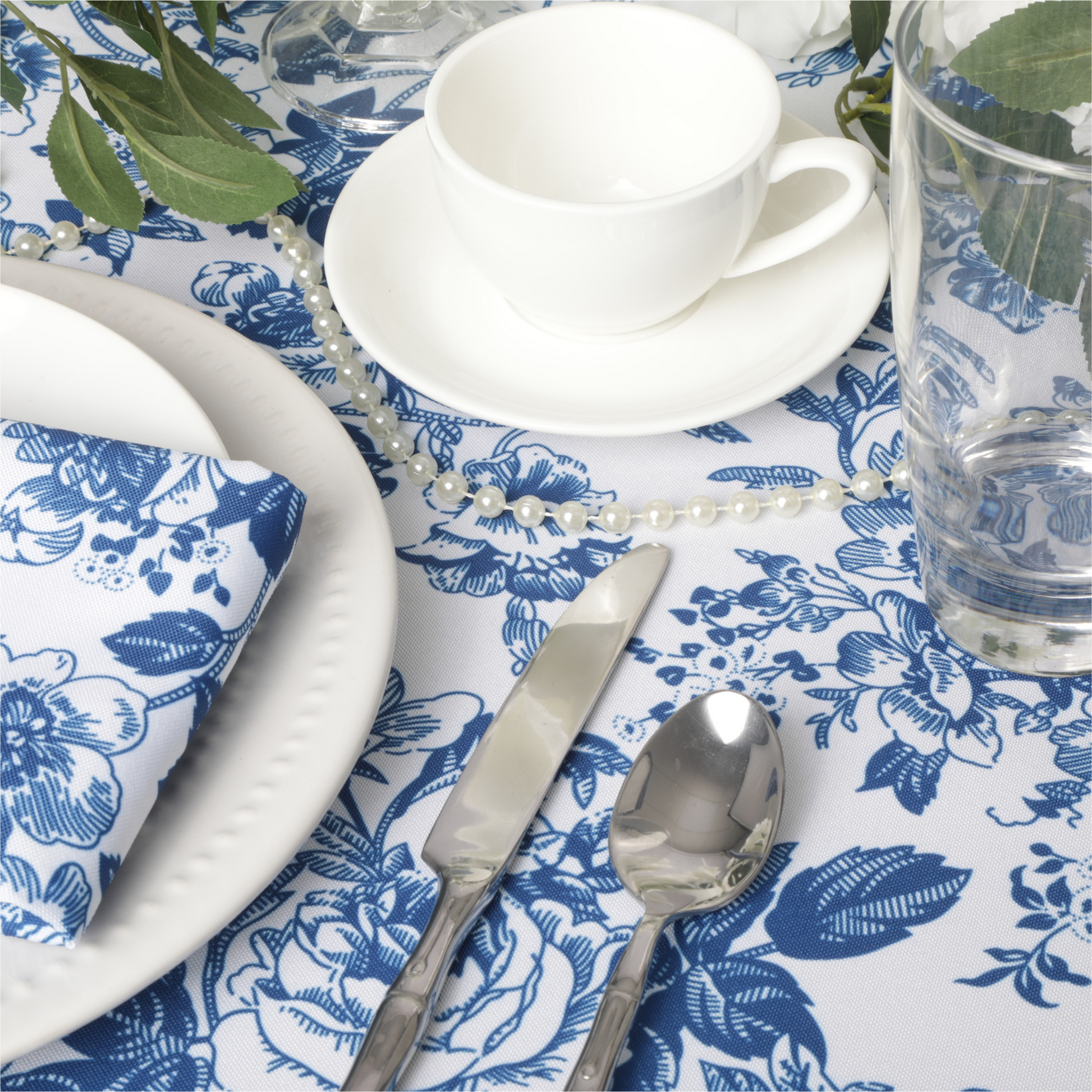 Blue French Toile Print Rectangular Tablecloth 108"x156" paired with white tea cup and saucer, pearls and silverware