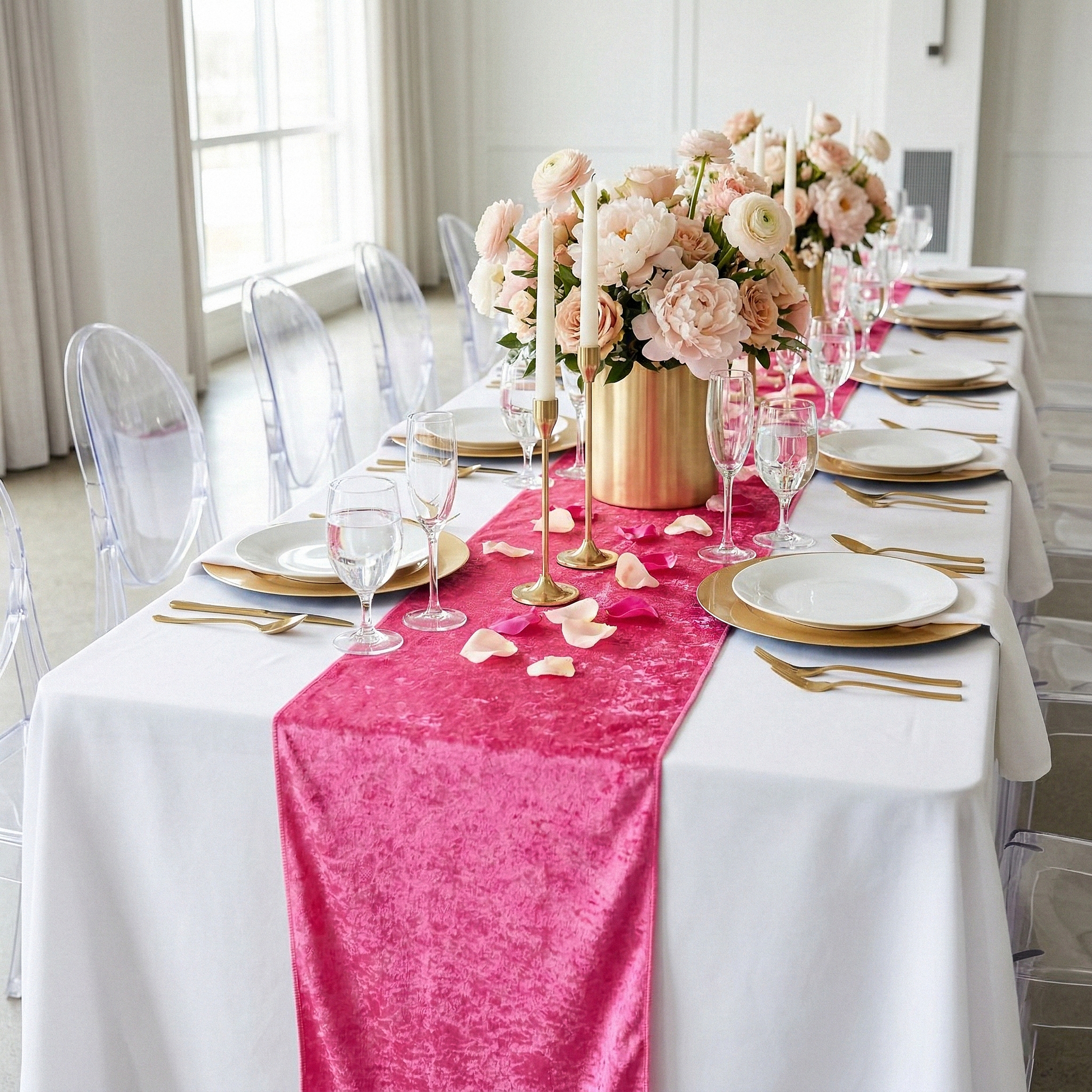Velvet Table Runner Fuchsia on a white tablecloth with pink floral centerpieces