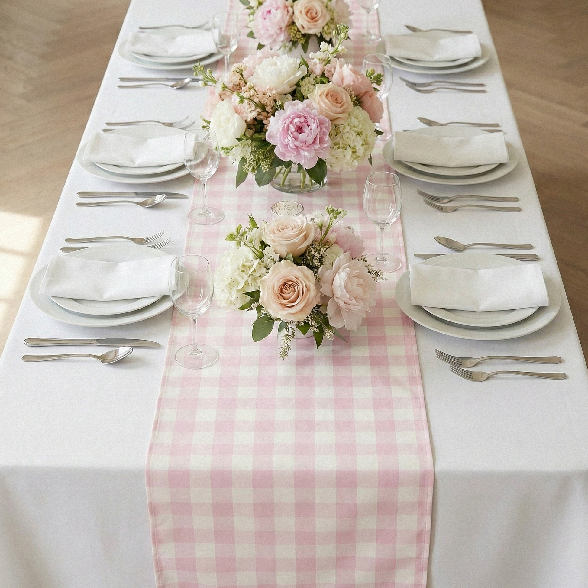 Gingham Checkered Polyester Table Runner Pink & White indoor setting  with mixed floral centerpieces and dinnerware