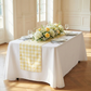 Gingham Checkered Polyester Table Runner Yellow & White indoor setting  with mixed floral centerpiece and dinnerware
