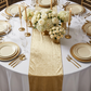 Glitter Velvet Table Runner Champagne close up  with votive candles and gold glass charger plates