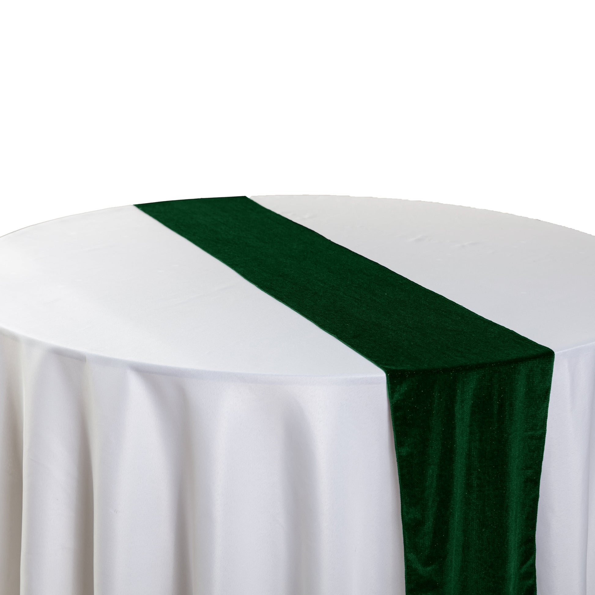 Glitter Velvet Table Runner Emerald Green angled view on a round tablecloth