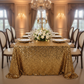 prom setup using Glitz Sequin 90"x132" Rectangular Tablecloth - Gold with gold charger plate and centerpiece