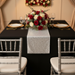 Glitz Sequin Table Runner - White on black tablecloth | gold charger plate | white dinner plate | silver chiavari chair