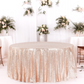 front view indoor setup showingGlitz Sequins 120" Round Tablecloth - Blush/Rose Gold