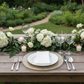 outdoor garden wedding table reception with Gold Braided Rim Glass Charger Plate
