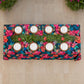 birdseye view Hawaiian Tahiti Floral Scuba Rectangular Tablecloth wedding table with rattan placemats and tropical floral centerpiece
