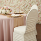 bridal shower brunch setup showing Ivory Ruched Fashion Spandex Banquet Chair Cover with blush rosegold tablecloth and gold table runner and charger plate