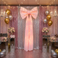 LED Chiffon Bow for Backdrop Pastel Pink paired with Glitz silver and pink backdrop drapes 