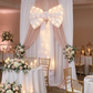 LED Chiffon Bow for Backdrop White behind a bridal table