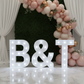 Large 4ft Tall LED Marquee Letter - T with balloon arch for wedding reception