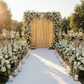 Large Payette Sequin 12ft H x 52" W Drape/Backdrop panel - Gold with premade flower runners on each side of uprights for outdoor wedding ceremony