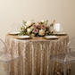 Large Payette Sequin Round 120" Tablecloth - Champagne with gold charger plate | white dinner plate | wine goblets | flower premade runner