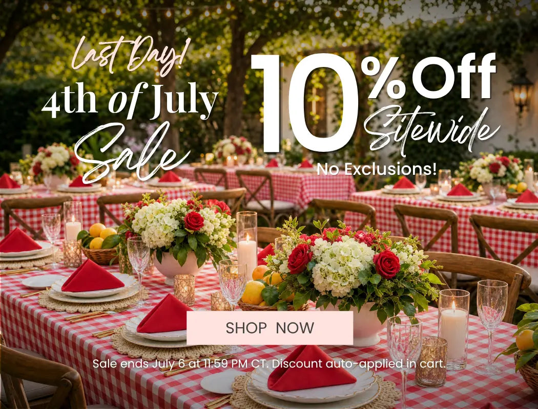 Last Day 4th of July sale banner on homepage with red-checkered tables, floral centerpieces, and 10% off sitewide.