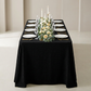 Luxury Boucle Rectangular Tablecloth Black white dinner plates, gold flatware and wine glasses