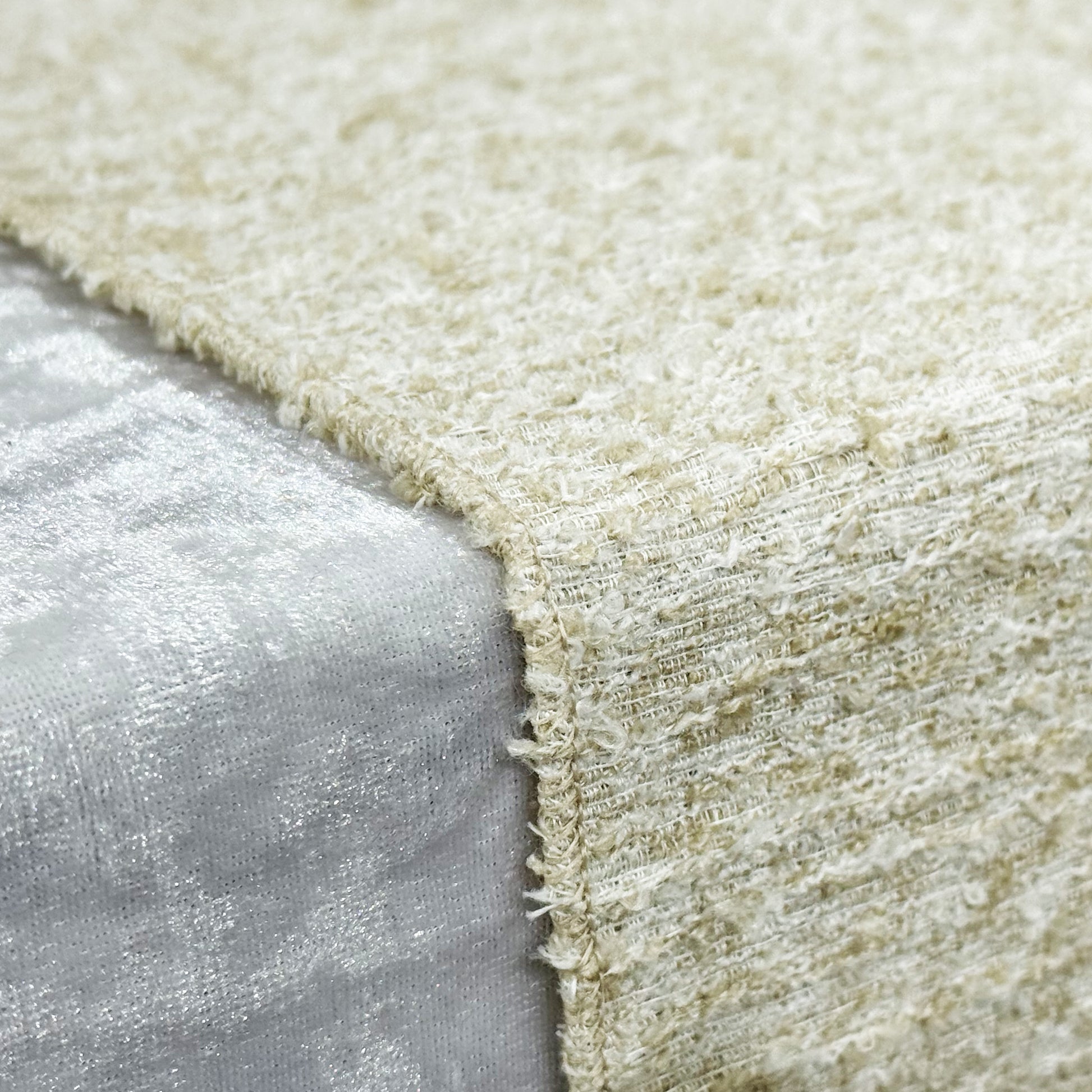 close up of the Luxury Boucle Table Runner Beige serged edge finish