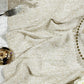Luxury Boucle Table Runner Beige ruched on a table