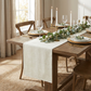 Luxury Boucle Table Runner Ivory on a natural brown dinner table 
