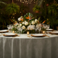 tropical wedding setup with Modern Palm Leaves 120" Round Tablecloth