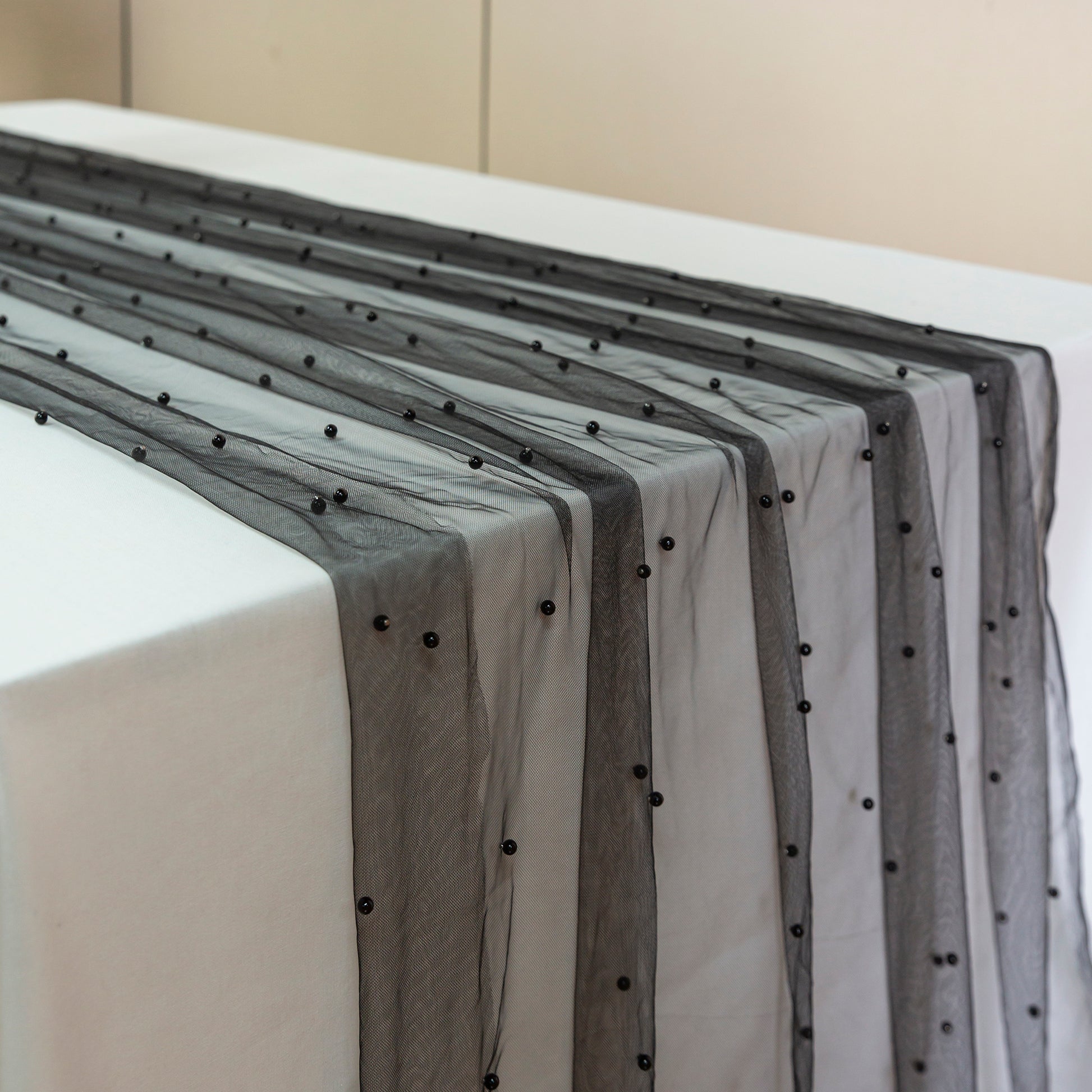 Pearl Tulle Table Runner 30" x 120" Black angled view