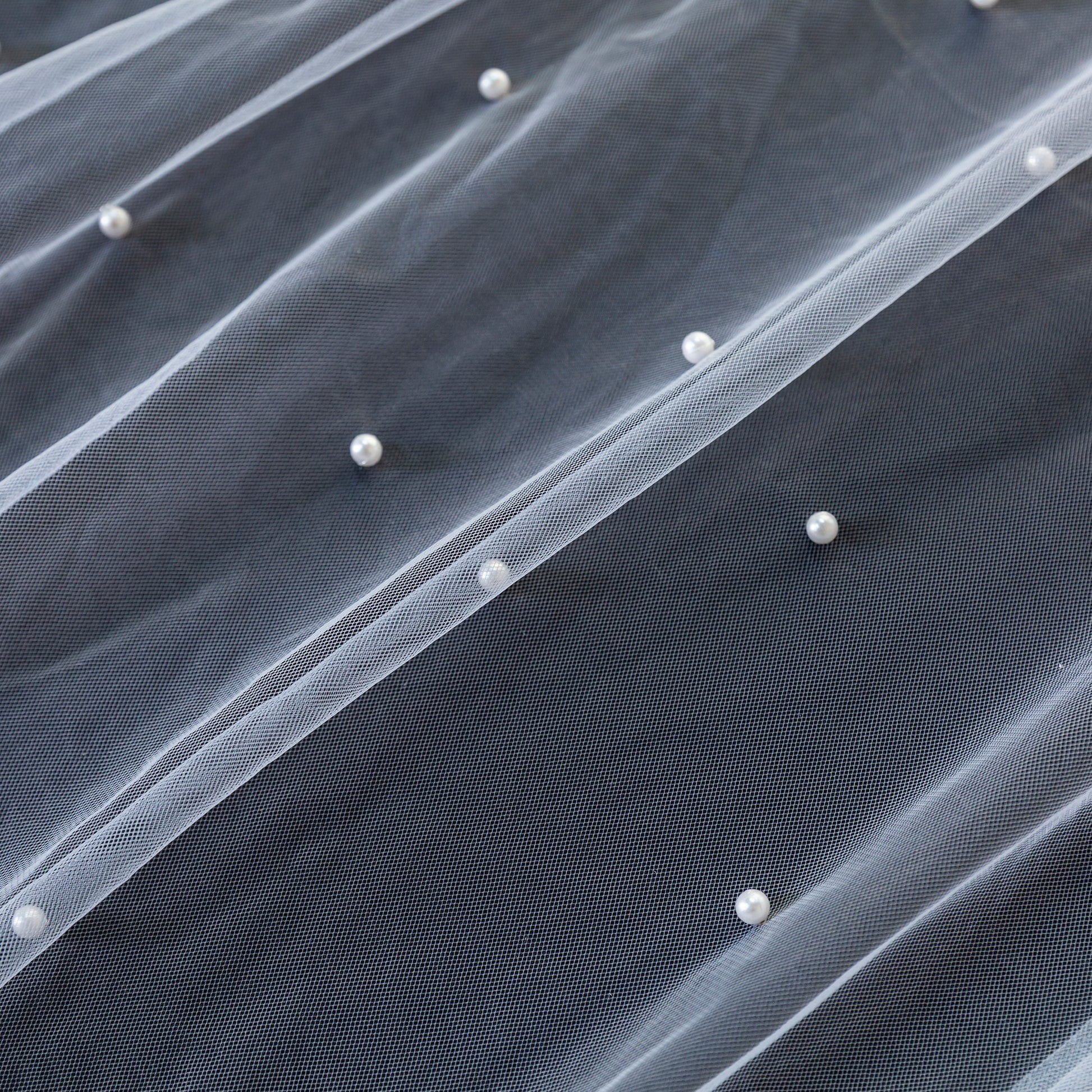 Pearl Tulle White fabric close up