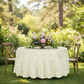 Petal Circle Taffeta Round 120" Tablecloth - Ivory with flower centerpiece for outdoor setup