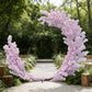 Pink Cherry Blossom Crescent Arch Backdrop outdoor setting with wood planks and greenery