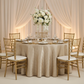 Pintuck 132" Round Tablecloth - Champagne with gold charger plate | white napkin | white dinner plate | gold chiavari chair 