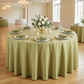 Polyester Round Tablecloth Moss Green paired with moss green napkins ontop a white dinner plate, wine glasses and white rose floral centerpiece