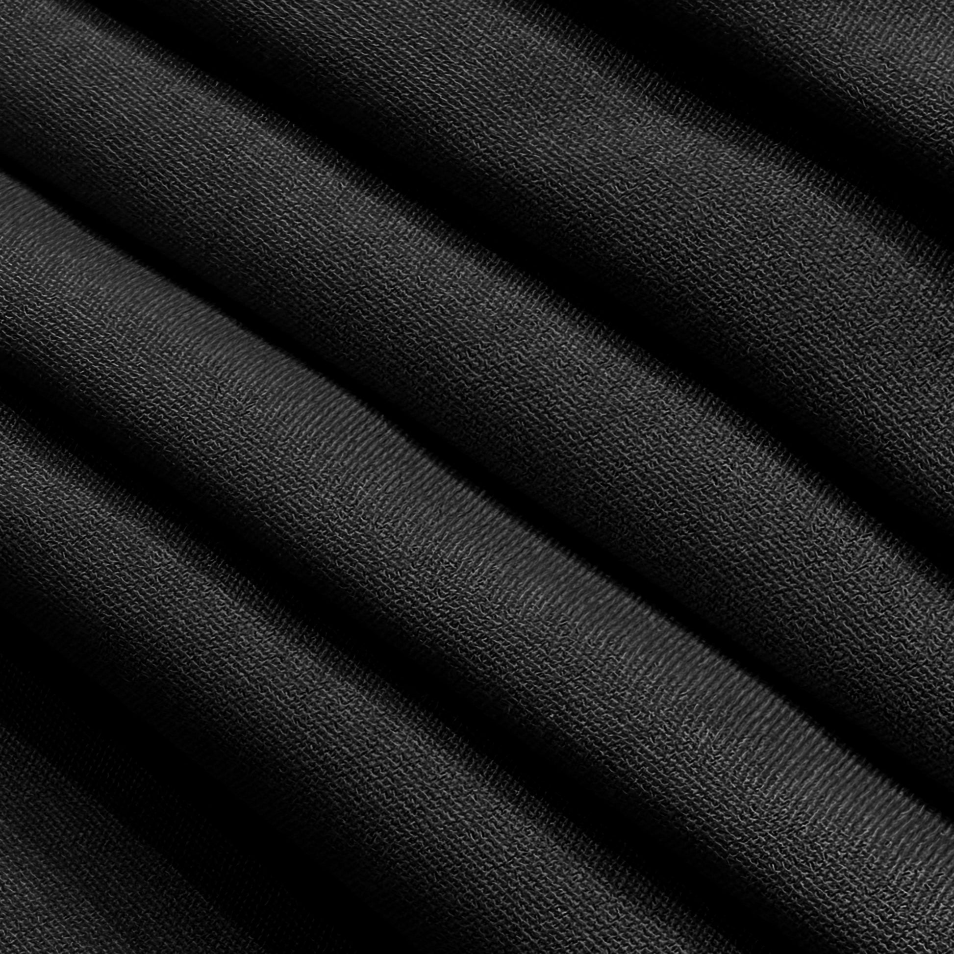 Premium 132" Round Black Spun Polyester Tablecloth fabric close up