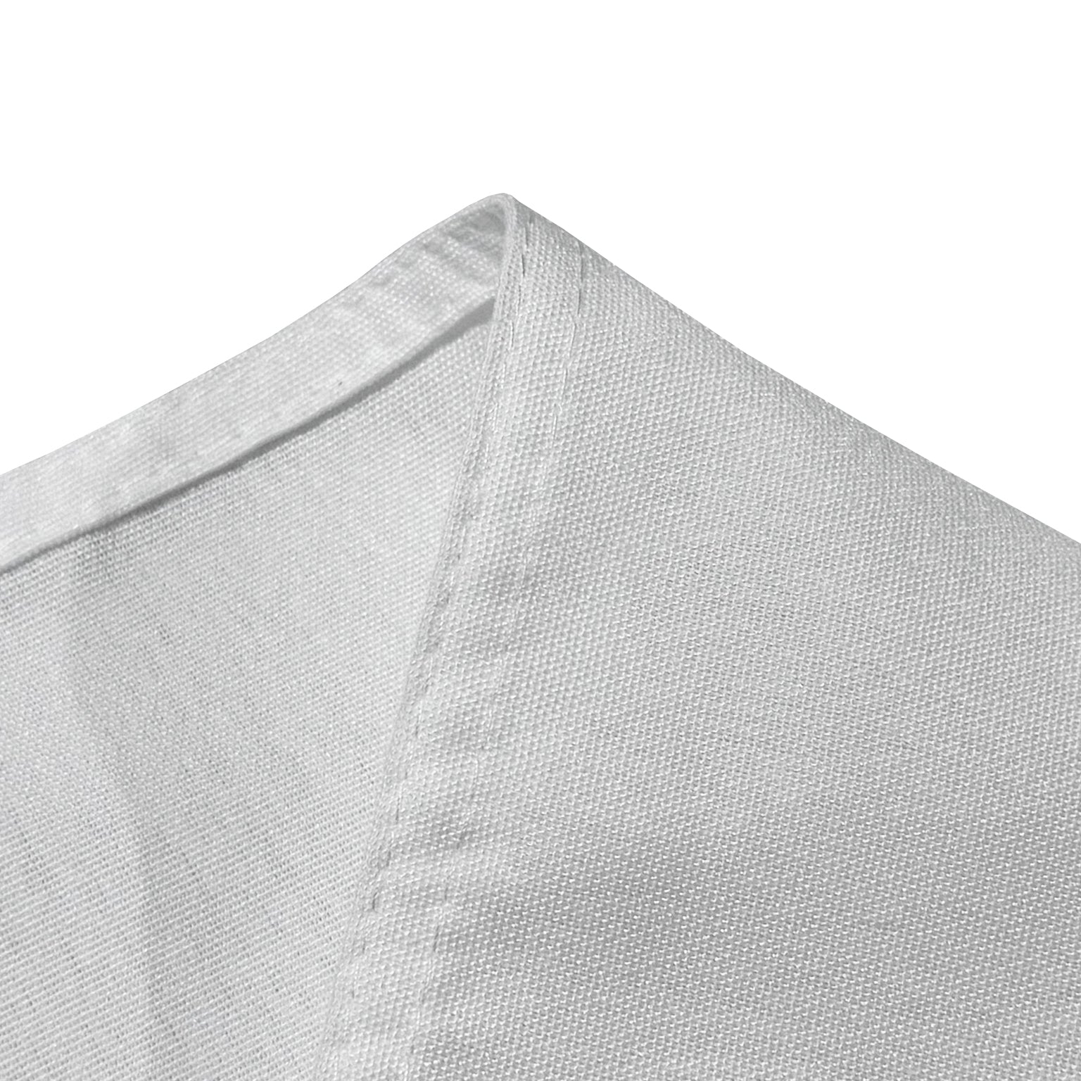 Premium 132" Round White Spun Polyester Tablecloth hemmed close up