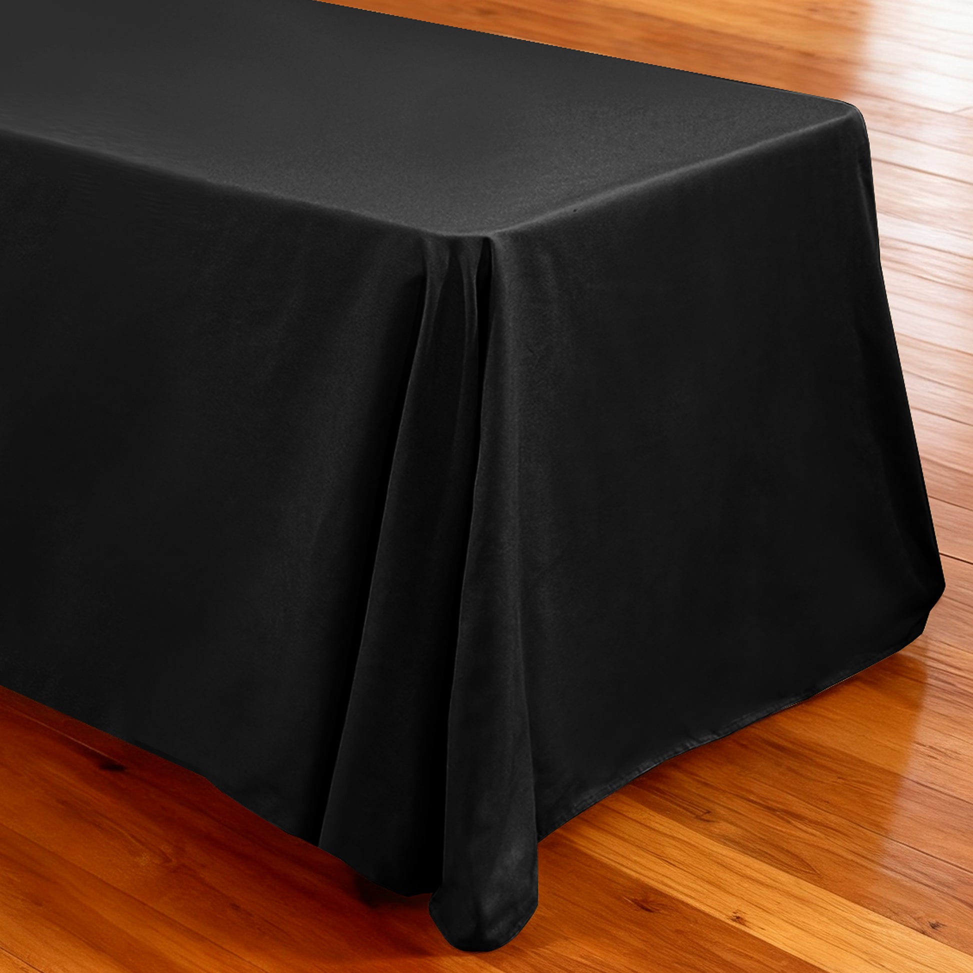Premium 90"x132" Rectangular Black Spun Polyester Tablecloth end view