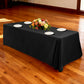 Premium 90"x132" Rectangular Black Spun Polyester Tablecloth with white charger plates and floral centerpiece