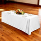 Premium 90"x132" Rectangular White Spun Polyester Tablecloth with white charger plates and floral centerpiece