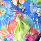 Premium Polyester Napkin 19"x19" Apple Green table setting with a tie dye tablecloth and clear glass goblets