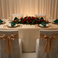 formal dinner with Premium Polyester Napkin 20"x20" - Forest Green on top of champagne tablecloth and gold charger plate